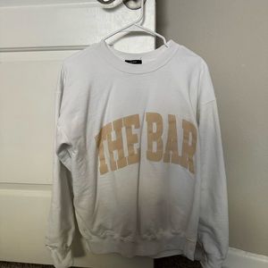 THE BAR Varsity sweatshirt in White with Tan Lettering